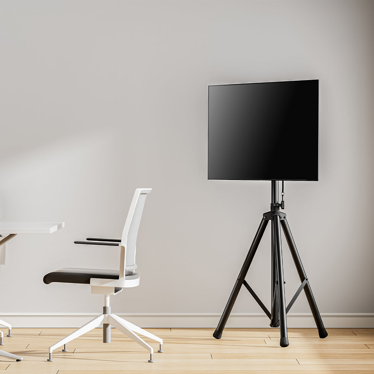 SH-08-46T tilting tripod TV floor stand with TV mounted in office setting