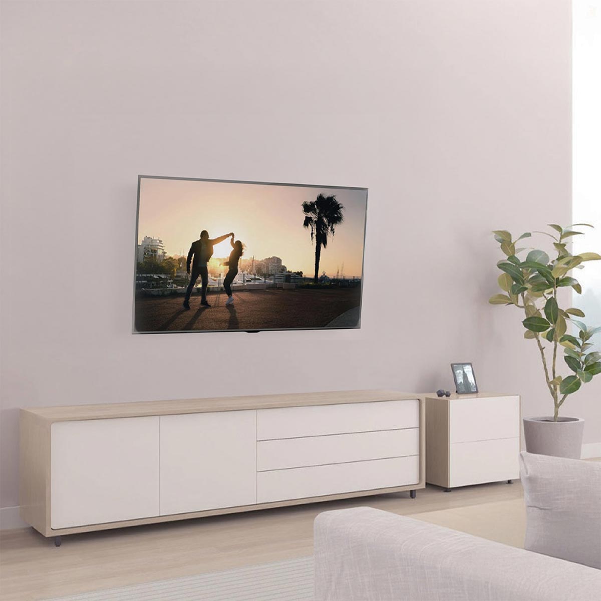 PM-202PW full-motion TV wall mount installed in a modern living room