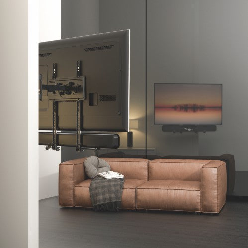 VSYS VSSB-49 soundbar bracket installed below wall-mounted TV