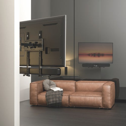VSYS VSSB-49 soundbar bracket installed below wall-mounted TV